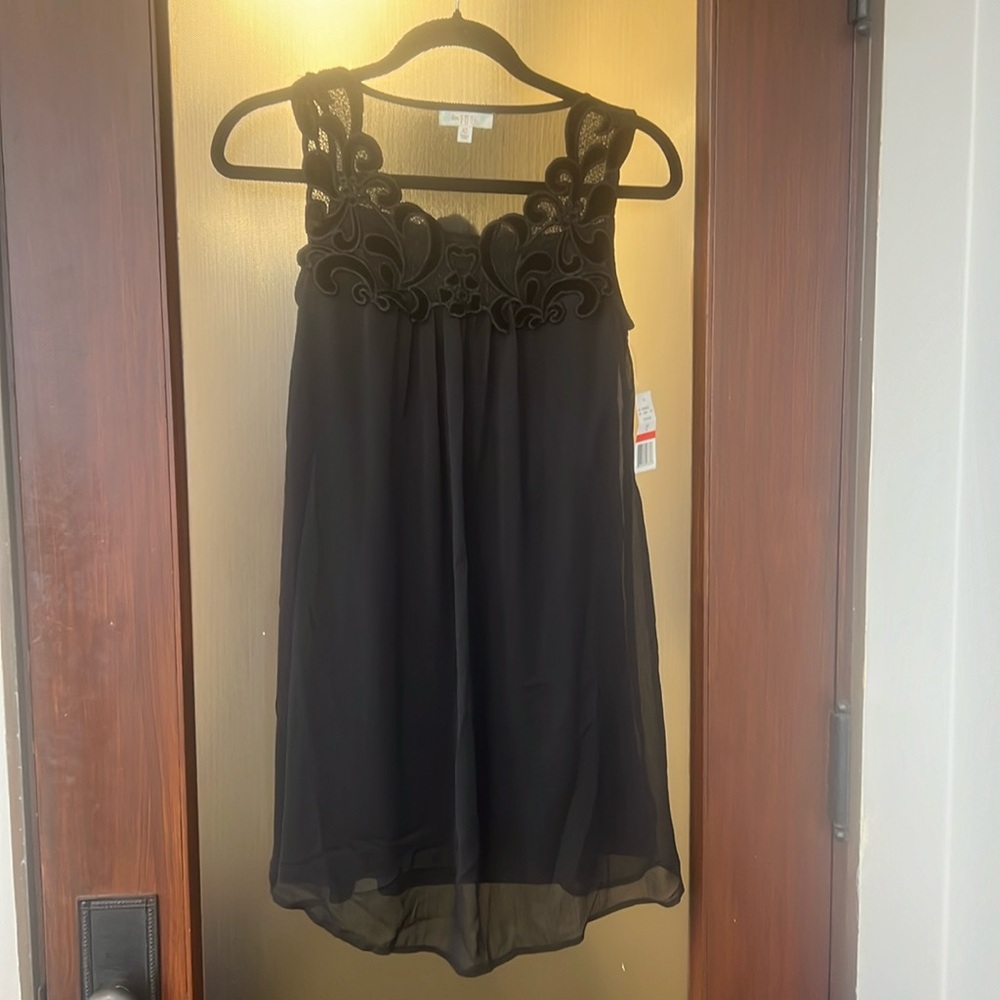 Black XS babydoll mini dress with velvet lace detailing by Love Fire